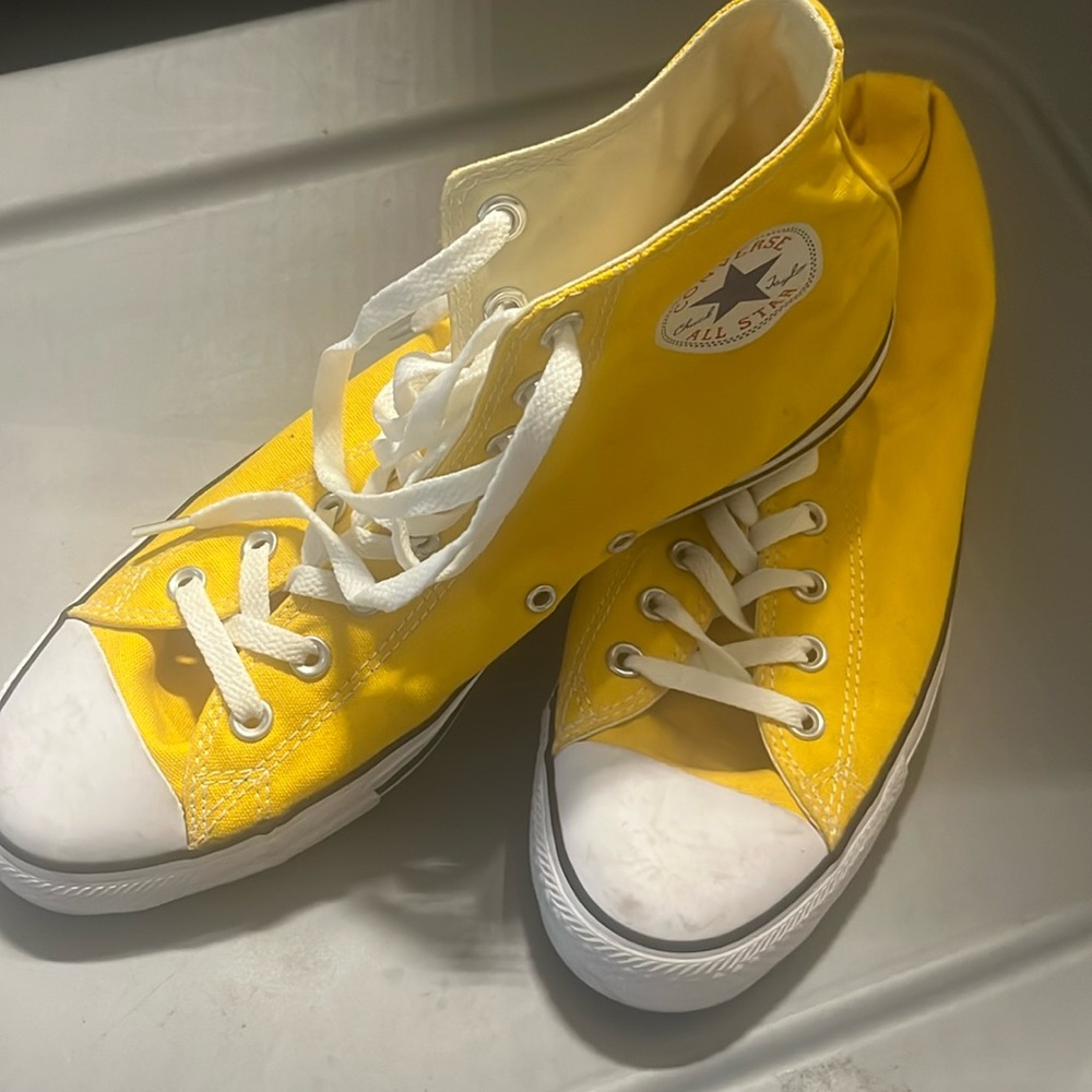 Yellow high top converse